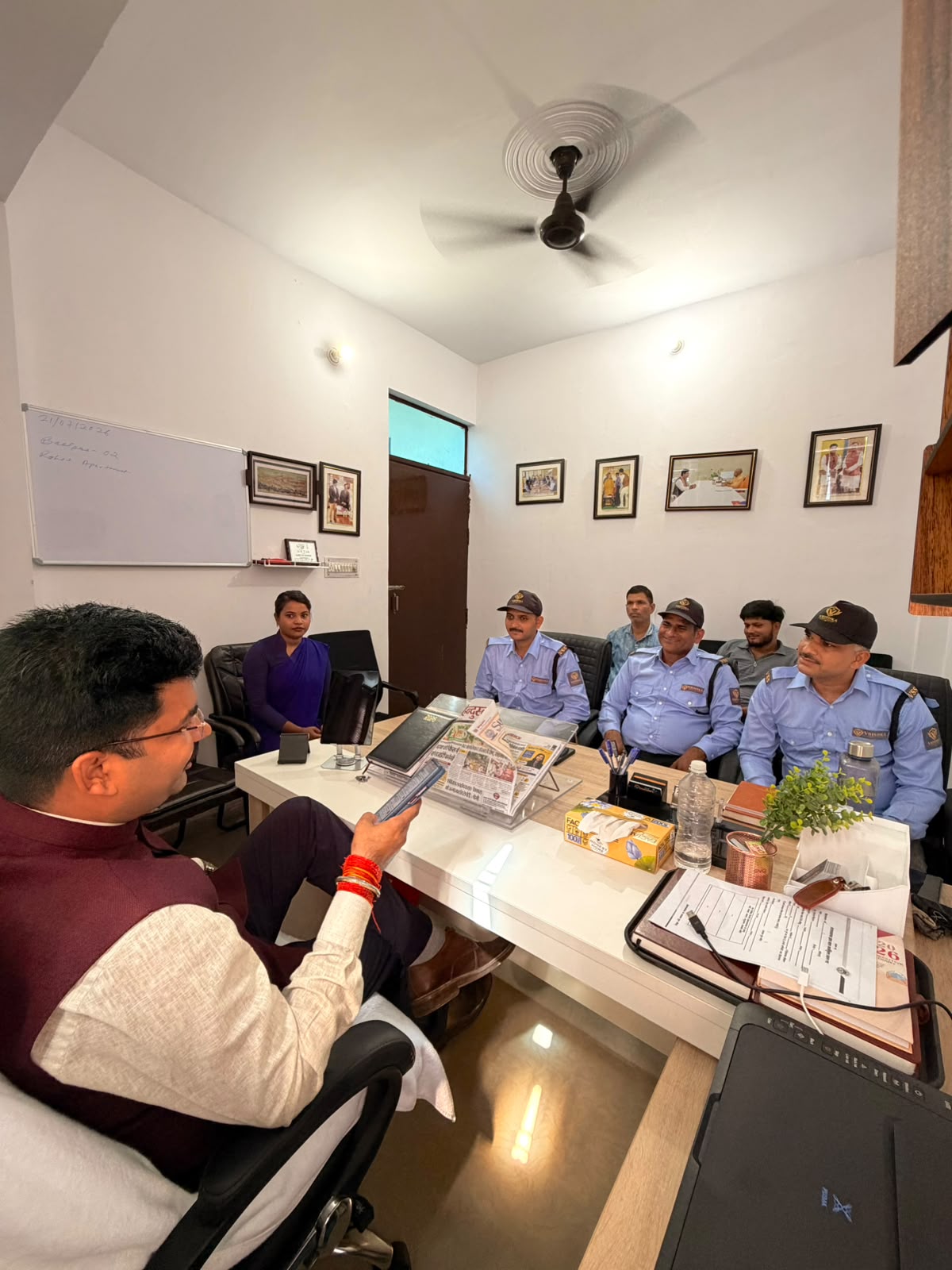 Managing Director reviewing deployment with staff